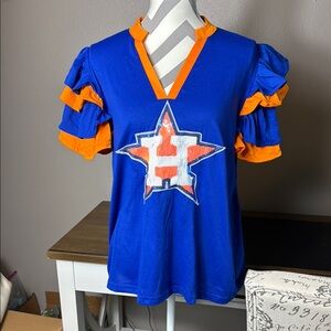 Houston Astros ruffled sleeve top with sequin Astros Symbol on front. NWOT